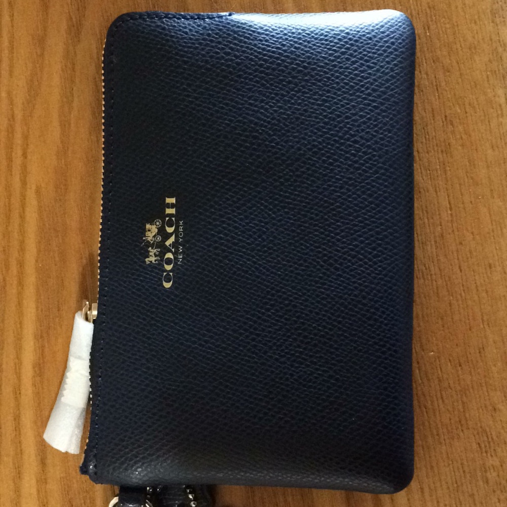 Brand new navy Coach wristlet